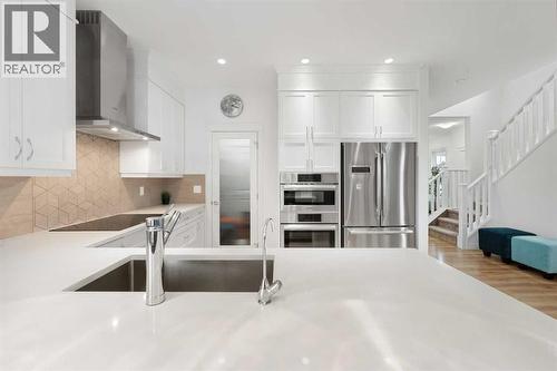 99 Evansglen Circle Nw, Calgary, AB - Indoor Photo Showing Kitchen With Upgraded Kitchen