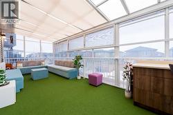 A three-season sunroom on the main level.. - 