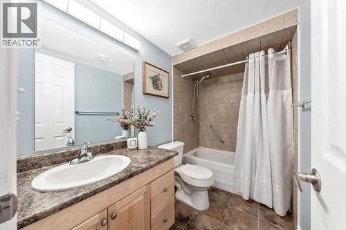 4th Lower level bedroom - 361 Cimarron Boulevard, Okotoks, AB - Indoor Photo Showing Bathroom