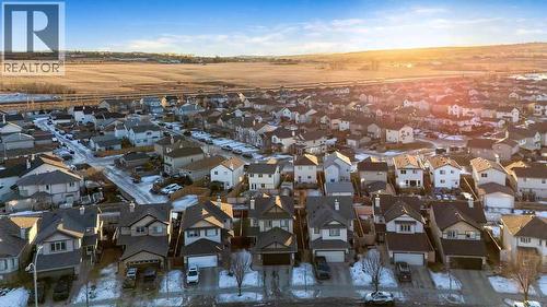 The spacious deck offers the perfect setting for entertaining and relaxing - 361 Cimarron Boulevard, Okotoks, AB - Outdoor With View
