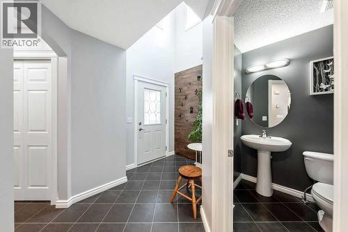 Main floor powder room - 361 Cimarron Boulevard, Okotoks, AB - Indoor Photo Showing Bathroom