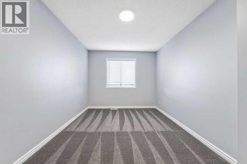 3rd Upper floor bedroom - 361 Cimarron Boulevard, Okotoks, AB - Indoor Photo Showing Other Room