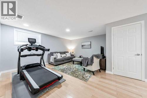 361 Cimarron Boulevard, Okotoks, AB - Indoor Photo Showing Gym Room