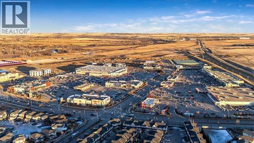 Large Commercial Complex justminutes from the property - 361 Cimarron Boulevard, Okotoks, AB - Outdoor With View