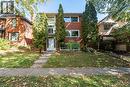 View of front of house featuring brick siding and a front yard - 62 Moore Avenue, Kitchener, ON  - Outdoor 