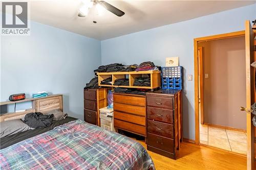 Bedroom featuring light wood-style flooring and a ceiling fan - 62 Moore Avenue, Kitchener, ON - Indoor Photo Showing Bedroom