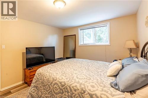 Bedroom featuring wood finished floors and baseboards - 62 Moore Avenue, Kitchener, ON - Indoor Photo Showing Bedroom