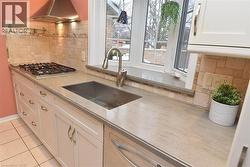 Gas Stovetop and elegant quartz counters - 