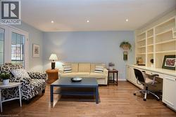 Sep Main Lvl Family Rm with Custom Built Shelving! - 