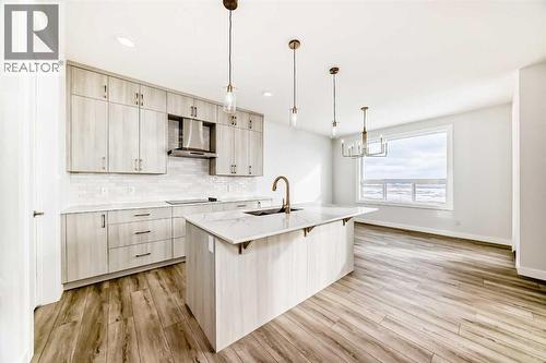 100 Corner Glen Manor Ne, Calgary, AB - Indoor Photo Showing Kitchen With Upgraded Kitchen