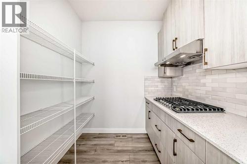 100 Corner Glen Manor Ne, Calgary, AB - Indoor With Storage