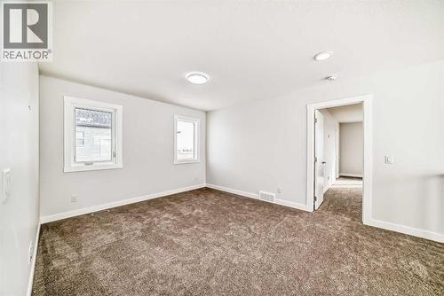 100 Corner Glen Manor Ne, Calgary, AB - Indoor Photo Showing Other Room