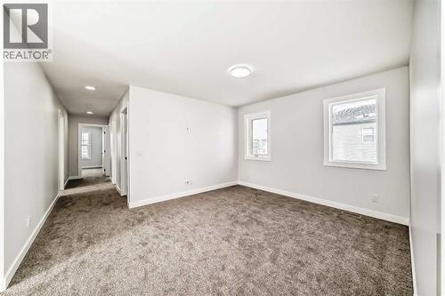 100 Corner Glen Manor Ne, Calgary, AB - Indoor Photo Showing Other Room