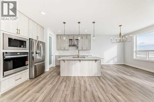 100 Corner Glen Manor Ne, Calgary, AB - Indoor Photo Showing Kitchen With Stainless Steel Kitchen With Upgraded Kitchen