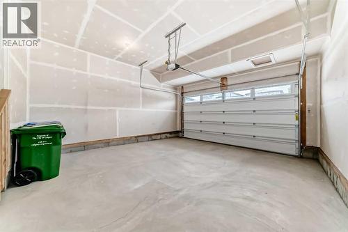 100 Corner Glen Manor Ne, Calgary, AB - Indoor Photo Showing Garage