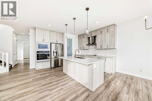 100 Corner Glen Manor Ne, Calgary, AB - Indoor Photo Showing Kitchen With Stainless Steel Kitchen With Upgraded Kitchen