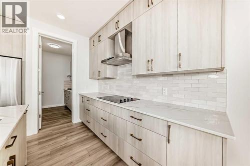 100 Corner Glen Manor Ne, Calgary, AB - Indoor Photo Showing Kitchen With Upgraded Kitchen