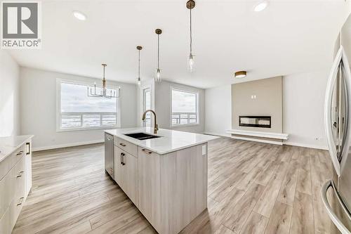 100 Corner Glen Manor Ne, Calgary, AB - Indoor Photo Showing Kitchen With Double Sink With Upgraded Kitchen
