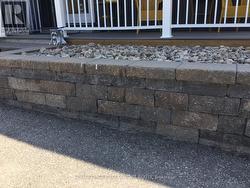 Front retaining wall - 