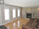1506 E Avenue N, Saskatoon, SK  - Indoor Photo Showing Living Room With Fireplace 