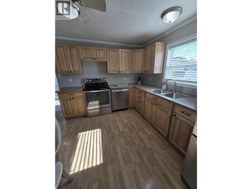 8224 99 Avenue, Fort St. John, BC - Indoor Photo Showing Kitchen With Double Sink