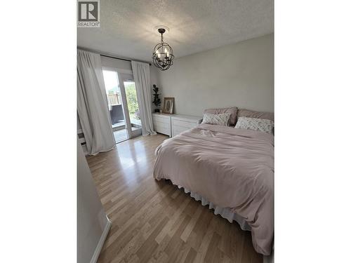 8224 99 Avenue, Fort St. John, BC - Indoor Photo Showing Bedroom