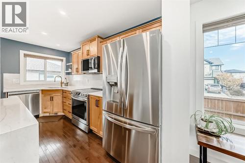 182 Sunset Heights, Cochrane, AB - Indoor Photo Showing Kitchen