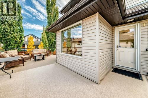 182 Sunset Heights, Cochrane, AB - Outdoor With Deck Patio Veranda With Exterior