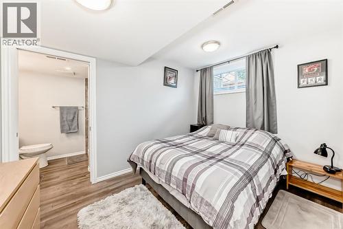 182 Sunset Heights, Cochrane, AB - Indoor Photo Showing Bedroom