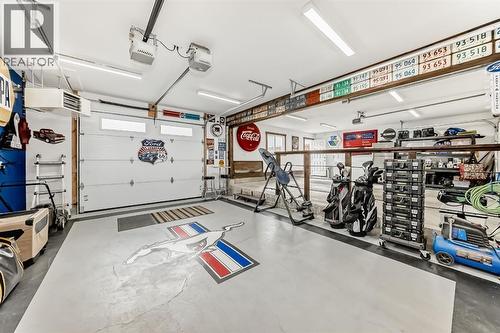 182 Sunset Heights, Cochrane, AB - Indoor Photo Showing Garage