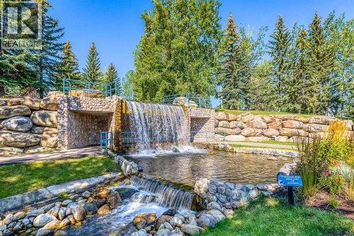 Lake Chaparral Waterfalls (one of) - 15 Chaparral Crescent Se, Calgary, AB - Outdoor