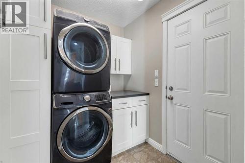 29 Sunset Close, Cochrane, AB - Indoor Photo Showing Laundry Room