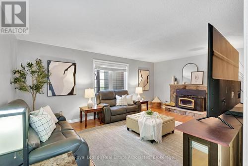 23 Madrid Crescent, Brampton, ON - Indoor Photo Showing Living Room With Fireplace