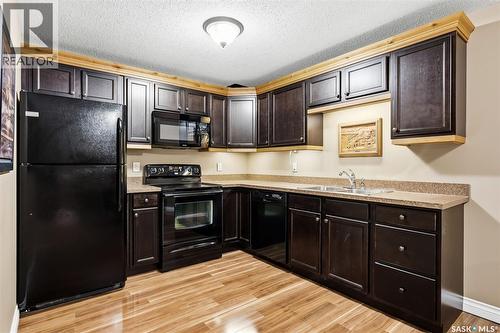 2419 Jameson Crescent, Regina, SK - Indoor Photo Showing Kitchen With Double Sink