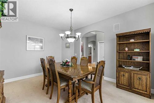 69 Evergreen Crescent Sw, Calgary, AB - Indoor Photo Showing Dining Room