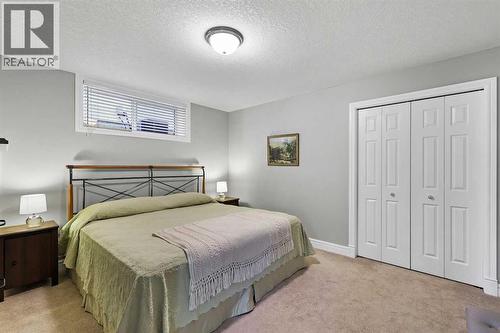 69 Evergreen Crescent Sw, Calgary, AB - Indoor Photo Showing Bedroom