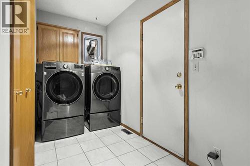 332 Hawkstone Close Nw, Calgary, AB - Indoor Photo Showing Laundry Room