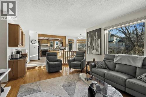 332 Hawkstone Close Nw, Calgary, AB - Indoor Photo Showing Living Room