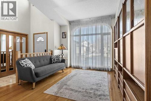 332 Hawkstone Close Nw, Calgary, AB - Indoor Photo Showing Living Room