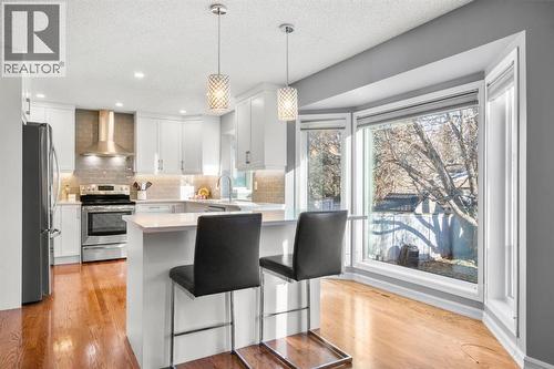 16 Woodacres Drive Sw, Calgary, AB - Indoor Photo Showing Kitchen With Upgraded Kitchen