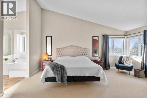 16 Woodacres Drive Sw, Calgary, AB - Indoor Photo Showing Bedroom