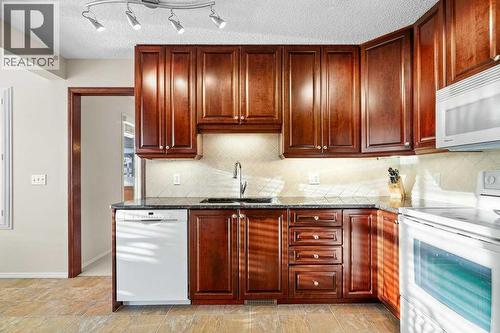 63 Douglas Park Boulevard Se, Calgary, AB - Indoor Photo Showing Kitchen