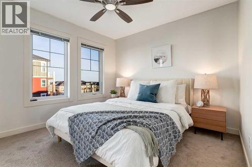 705 Evanston Square Nw, Calgary, AB - Indoor Photo Showing Bedroom