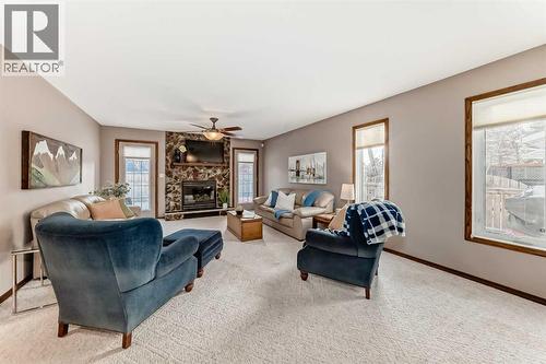 128 Dickenson Crescent, Red Deer, AB - Indoor Photo Showing Living Room With Fireplace