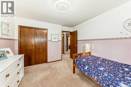 128 Dickenson Crescent, Red Deer, AB - Indoor Photo Showing Bedroom