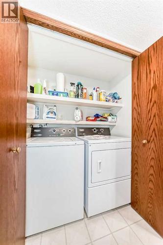 128 Dickenson Crescent, Red Deer, AB - Indoor Photo Showing Laundry Room