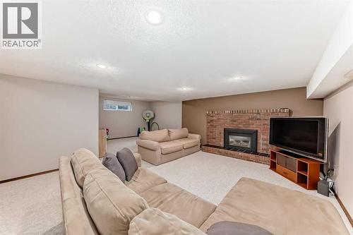 128 Dickenson Crescent, Red Deer, AB - Indoor With Fireplace