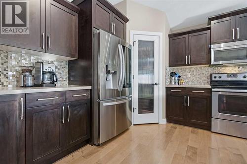 34 Cambridge Close, Blackfalds, AB - Indoor Photo Showing Kitchen With Upgraded Kitchen