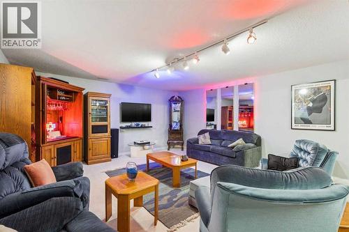 312 Prominence Heights Sw, Calgary, AB - Indoor Photo Showing Living Room
