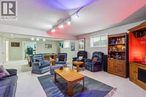 312 Prominence Heights Sw, Calgary, AB - Indoor Photo Showing Living Room